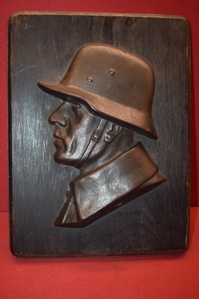 WW1 GERMAN SOLDIER  CAST IRON ON WOOD PLAQUE-SOLD