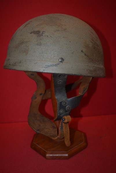 WW2 BRITISH PARATROOPERS HELMET WITH FIBRE RIM AND ORIGINAL LEATHER CHIN STRAP DATED 1943.-SOLD