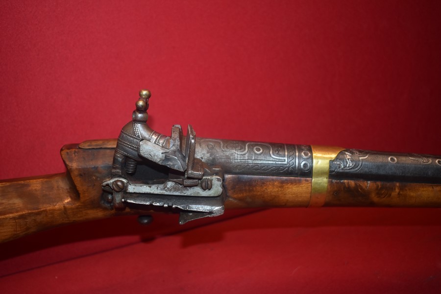 ISLAMIC ARABIC FLINTLOCK RIFLE WITH ORNATE DAMASCUS BARREL-SOLD