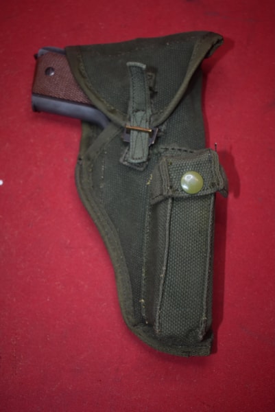 HOLSTER FOR THE 9MM BROWNING HI POWER PISTOL