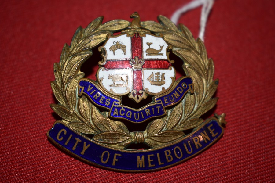 CITY OF MELBOURNE GILT AND ENAMEL HAT BADGE-SOLD