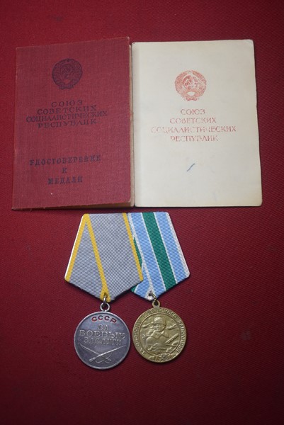WW2 RUSSIAN MEDAL PAIR WITH ISSUE BOOKS-SOLD