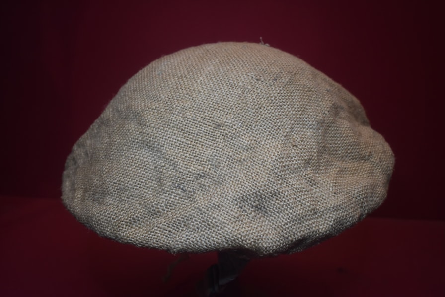WW1 BRITISH/COMMONWEALTH HESSIAN HELMET COVER MAKER MARKED-SOLD
