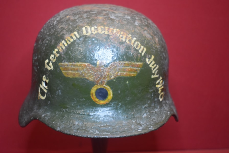 CHANNEL ISLANDS OCCUPATION SOUVENIER PAINTED RELIC GERMAN HELMET-SOLD 